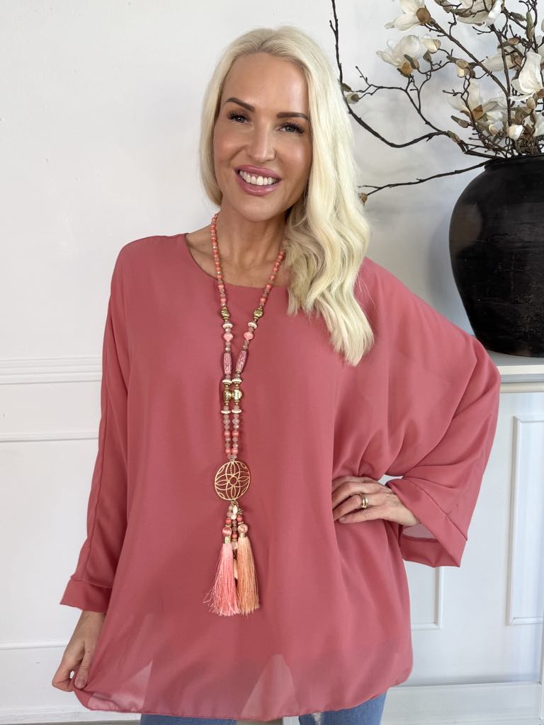 Flores - Tunika med chiffonglager och halvgenomskinliga ärmar